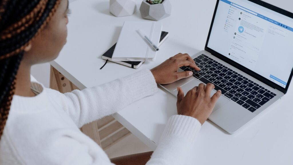 Social media management woman using laptop social media WOW social media marketing expert working on social media platforms and engagement strategies.